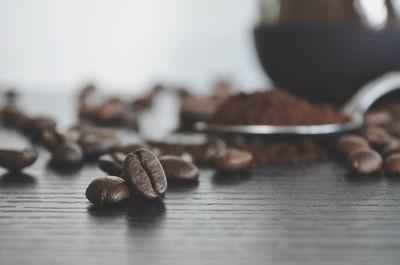 Close-up of coffee beans on table