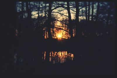 Scenic view of sunset over river