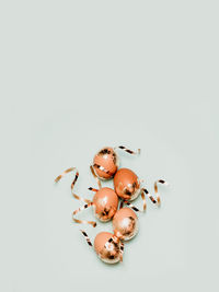 High angle view of eggs against white background