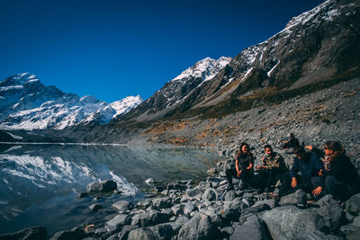 Scenic view of snowcapped mountains against clear sky