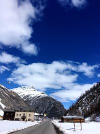 Snow covered mountain against sky