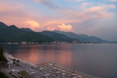 Scenic view of lake against sky during sunset