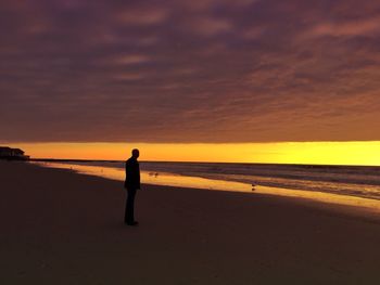Scenic view of sea at sunset