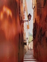 Alley amidst buildings in city