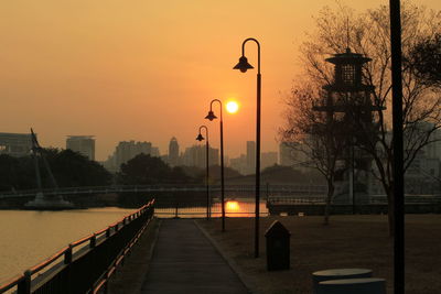 Street light against sky during sunset