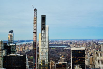 Modern buildings in city against sky