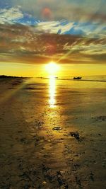 Scenic view of sea at sunset