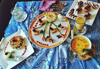 High angle view of breakfast served on table