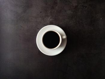 High angle view of coffee cup on table