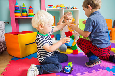 Students playing with toys