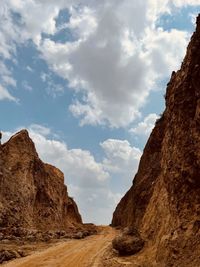 Rock formations on mountain against sky