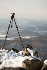Scenic view of snow covered mountain against sky