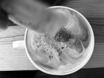 Directly above shot of coffee cup on table