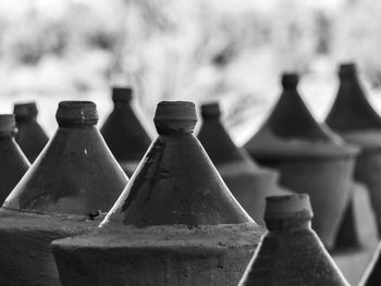 Close-up of bottles in row