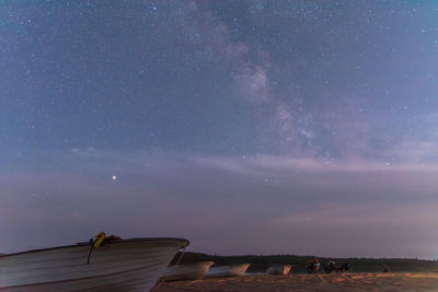 Scenic view of sea against sky at night