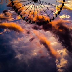 Low angle view of cloudy sky at sunset