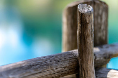 Close-up of wooden post on fence