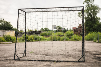 Scenic view of soccer field against sky