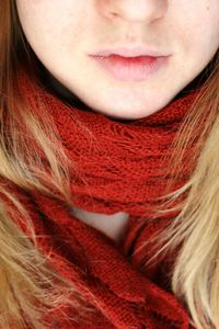 Midsection of woman with red scarf