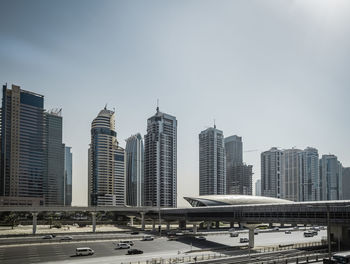 Modern buildings in city against sky