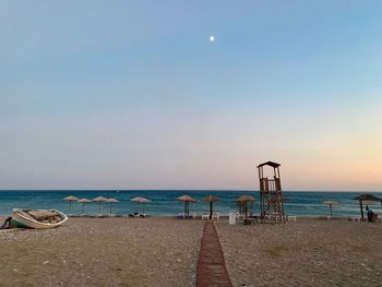 Scenic view of sea against sky at sunset