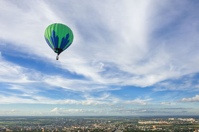 Many hot air balloons in the sky at blue sky with clouds background. abstract, aerial.