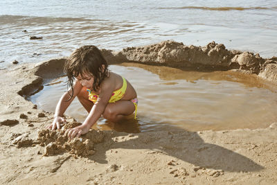 High angle view of boy on beach