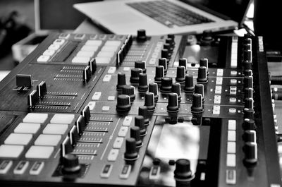 Close-up of control panel of sound mixer