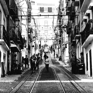 People walking on street in city