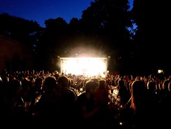 People enjoying music concert