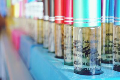 Close-up of multi colored pencils in jar