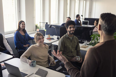 Group of business people having meeting in office