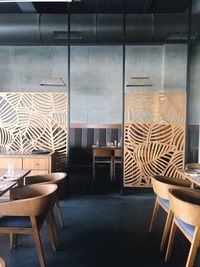 Chairs and table in corridor