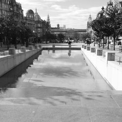 View of canal in city