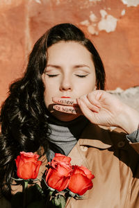 Close-up of woman with eyes closed