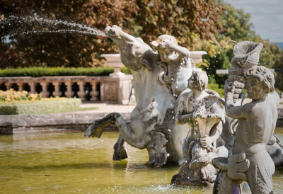 Statue of fountain in lake