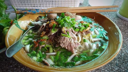 High angle view of beef soup noodles served in bowl