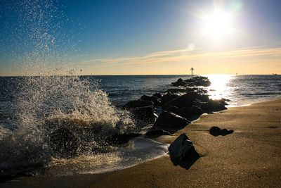 Scenic view of sea at sunset
