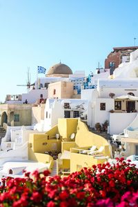 View of buildings against blue sky