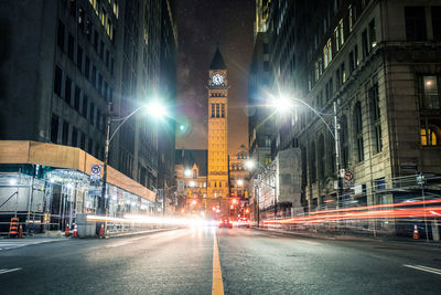 Light trails on city street at night