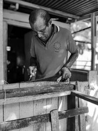 Man working on metal