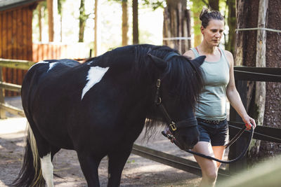 Woman riding horse