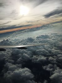 Aerial view of landscape against sky at sunset