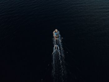 High angle view of rope in sea against sky