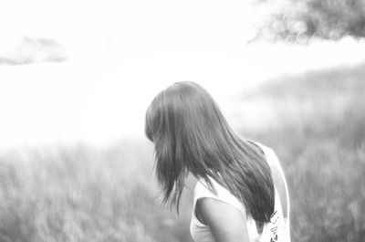 Woman standing on field