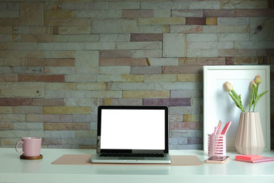 Close-up of laptop on table