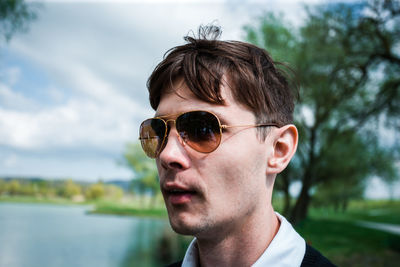 Portrait of young man looking away