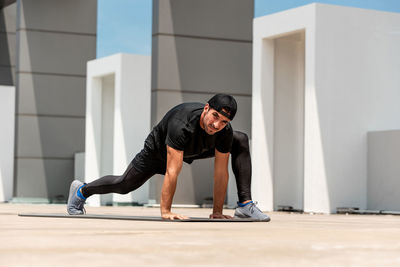 Full length of man exercising outdoors