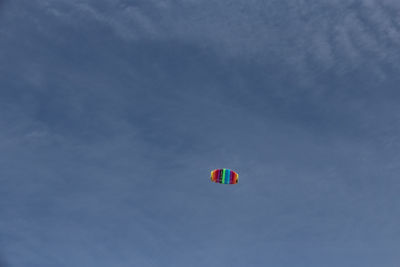 Low angle view of kite flying in sky