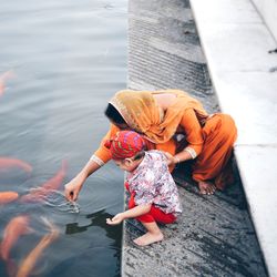 High angle view of baby girl in water